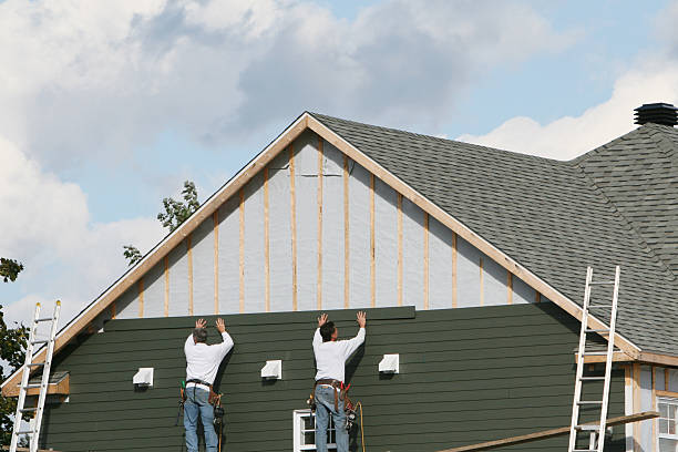 Professional Emergency Siding Repair technician working in Newell, WV